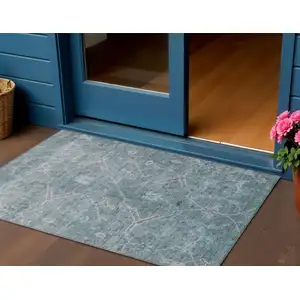 Photo of Teal Blue And Gray Floral Washable Indoor Outdoor Area Rug
