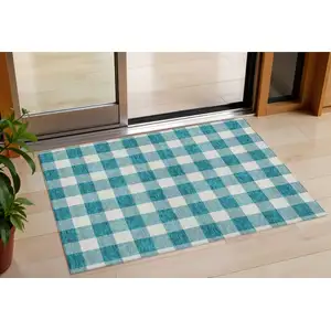 Photo of Teal Blue And Gray Plaid Washable Indoor Outdoor Area Rug