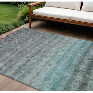Photo of Teal Blue And Gray Striped Washable Indoor Outdoor Area Rug