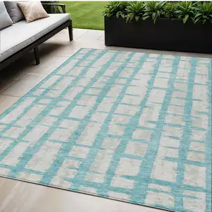 Photo of Teal Blue And Gray Striped Washable Indoor Outdoor Area Rug