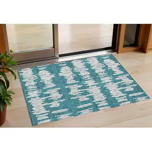 Photo of Teal Blue And Gray Striped Washable Indoor Outdoor Area Rug