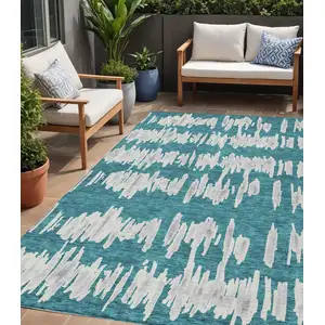 Photo of Teal Blue And Gray Striped Washable Indoor Outdoor Area Rug