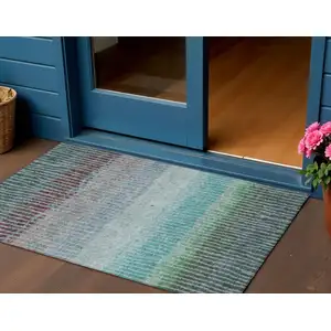 Photo of Teal Blue And Green Striped Washable Indoor Outdoor Area Rug