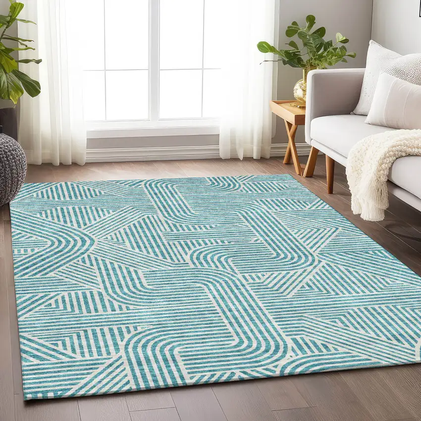 Teal Blue And Ivory Abstract Washable Indoor Outdoor Area Rug Photo 9