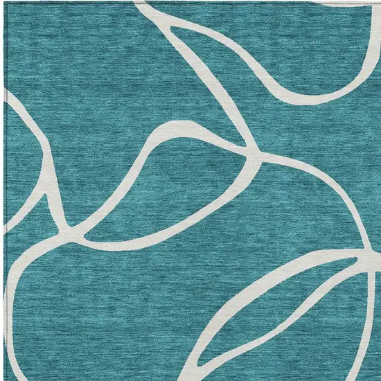 Teal Blue And Ivory Abstract Washable Indoor Outdoor Area Rug Photo 5