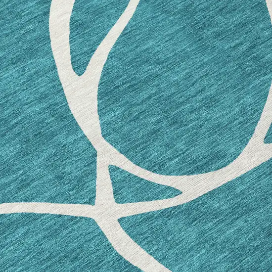 Teal Blue And Ivory Abstract Washable Indoor Outdoor Area Rug Photo 6