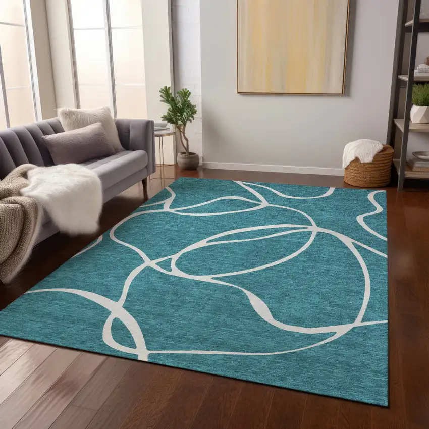 Teal Blue And Ivory Abstract Washable Indoor Outdoor Area Rug Photo 9
