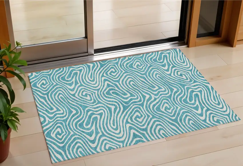 Teal Blue And Ivory Abstract Washable Indoor Outdoor Area Rug Photo 1