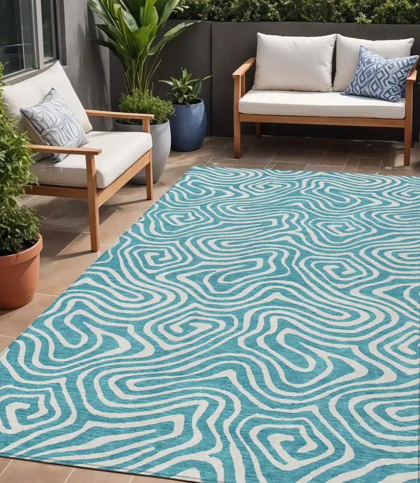 Teal Blue And Ivory Abstract Washable Indoor Outdoor Area Rug Photo 1