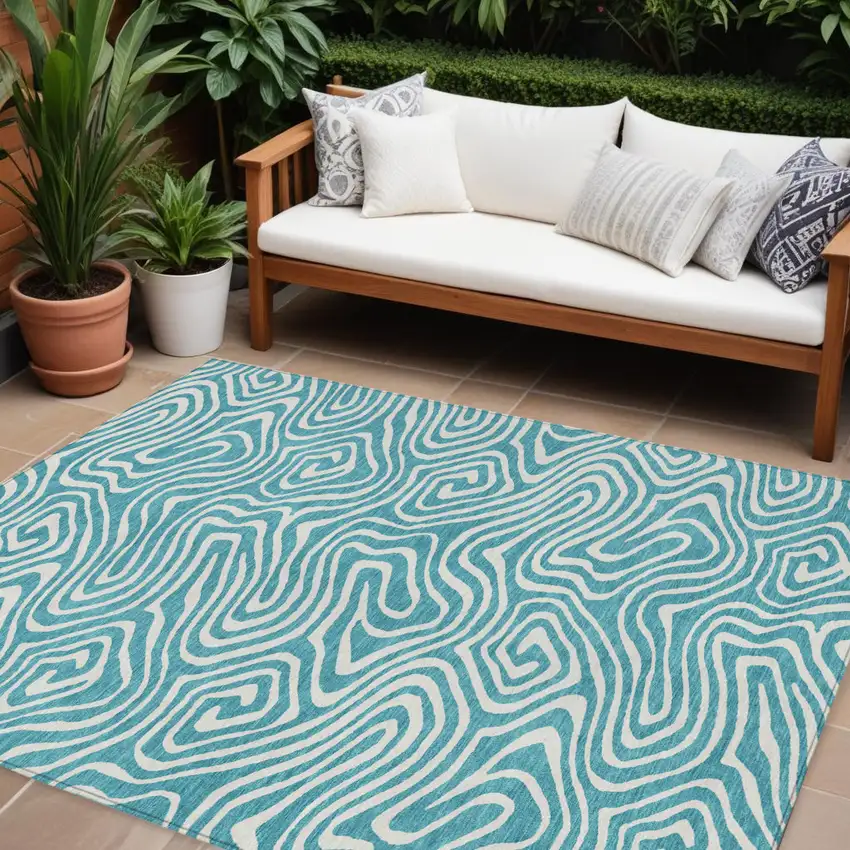 Teal Blue And Ivory Abstract Washable Indoor Outdoor Area Rug Photo 1