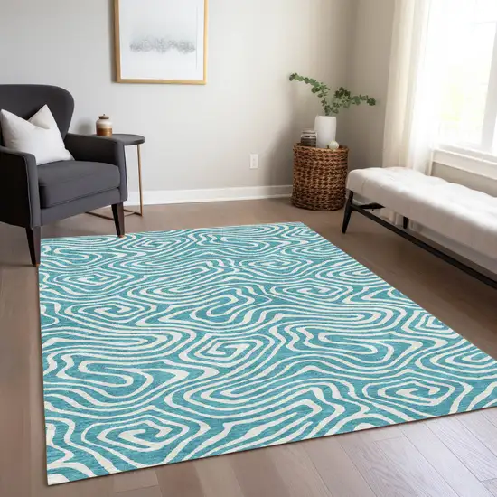 Teal Blue And Ivory Abstract Washable Indoor Outdoor Area Rug Photo 9