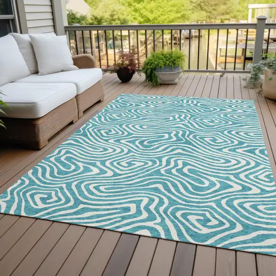 Teal Blue And Ivory Abstract Washable Indoor Outdoor Area Rug Photo 6