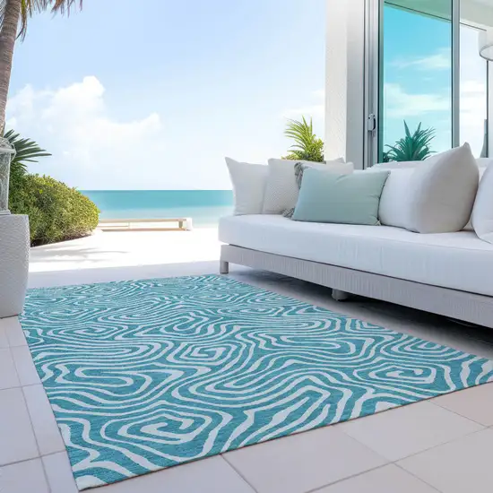 Teal Blue And Ivory Abstract Washable Indoor Outdoor Area Rug Photo 9