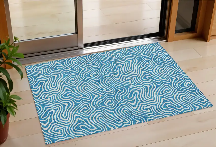 Teal Blue And Ivory Abstract Washable Indoor Outdoor Area Rug Photo 1