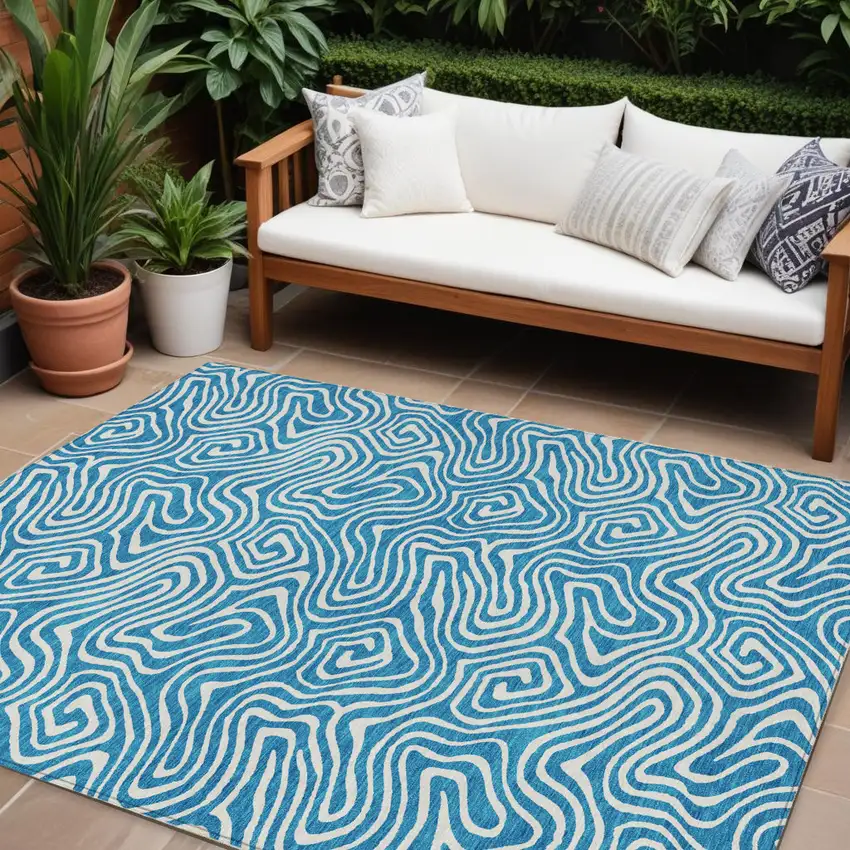 Teal Blue And Ivory Abstract Washable Indoor Outdoor Area Rug Photo 1