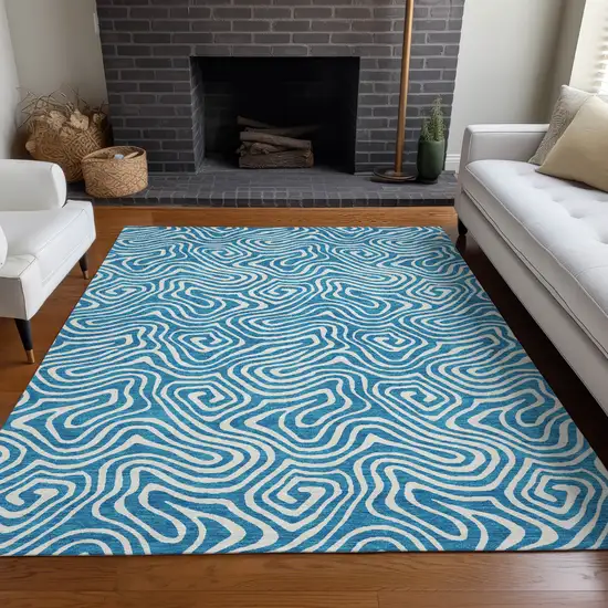 Teal Blue And Ivory Abstract Washable Indoor Outdoor Area Rug Photo 9