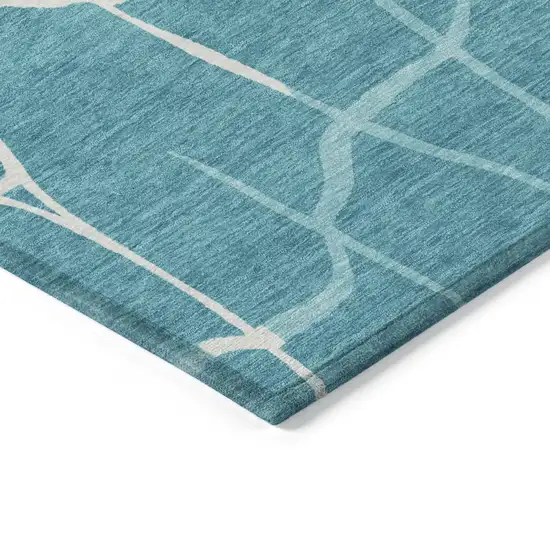 Teal Blue And Ivory Abstract Washable Indoor Outdoor Area Rug Photo 4
