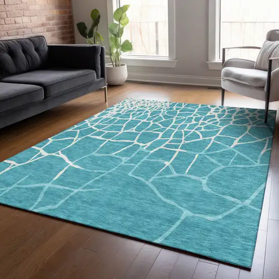 Teal Blue And Ivory Abstract Washable Indoor Outdoor Area Rug Photo 8