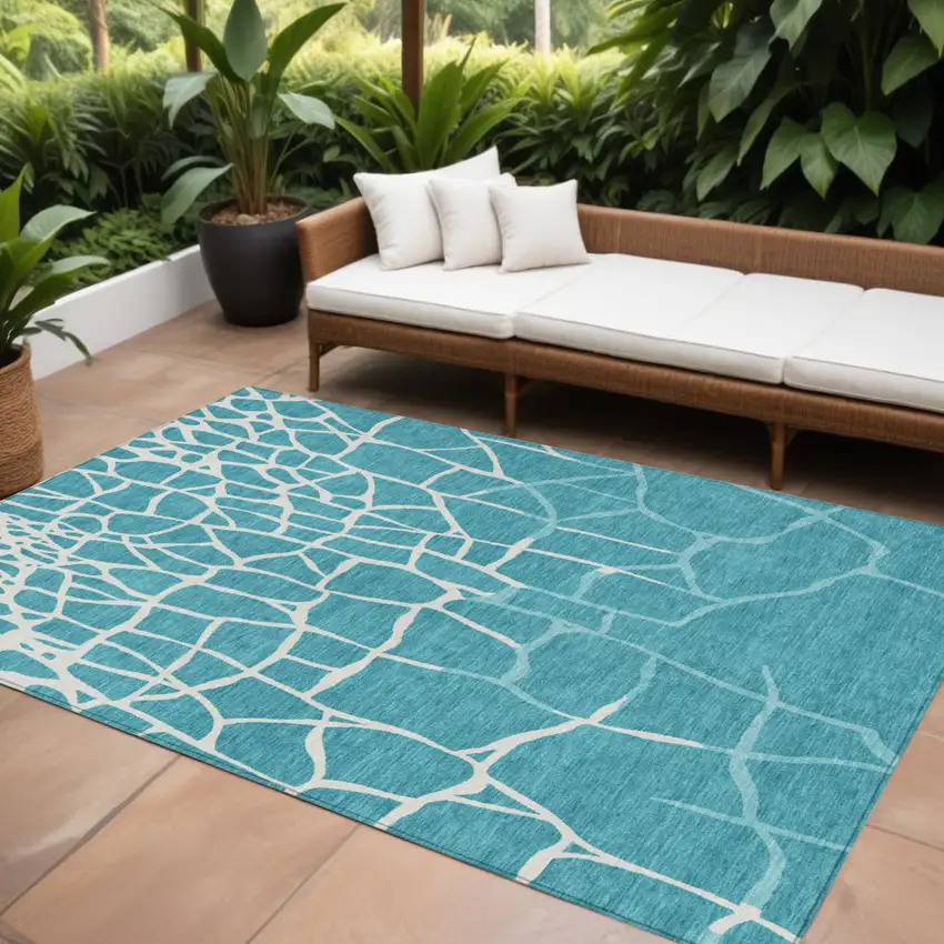 Teal Blue And Ivory Abstract Washable Indoor Outdoor Area Rug Photo 1