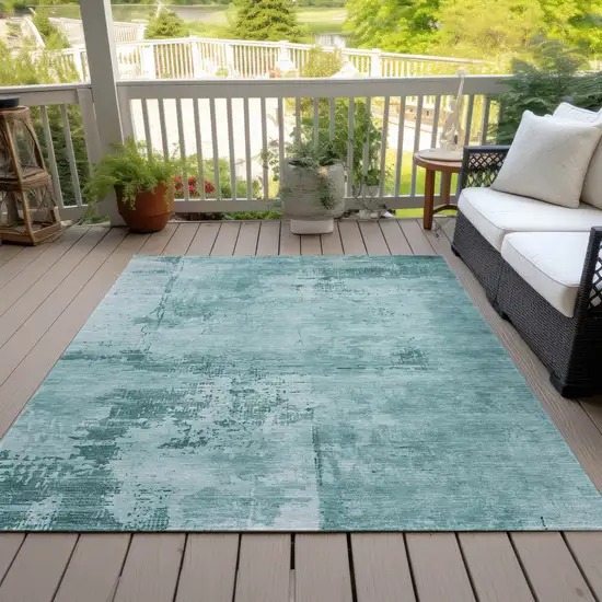 Teal Blue And Ivory Abstract Washable Indoor Outdoor Area Rug Photo 7