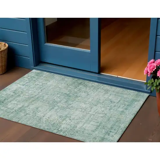 Teal Blue And Ivory Abstract Washable Indoor Outdoor Area Rug Photo 2