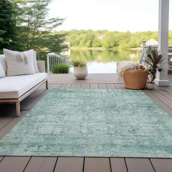 Teal Blue And Ivory Abstract Washable Indoor Outdoor Area Rug Photo 5
