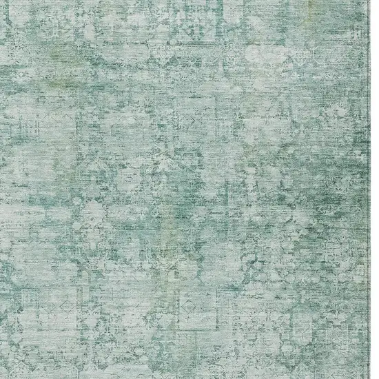 Teal Blue And Ivory Abstract Washable Indoor Outdoor Area Rug Photo 9