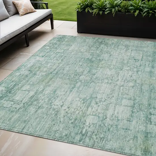 Teal Blue And Ivory Abstract Washable Indoor Outdoor Area Rug Photo 2