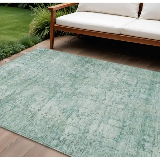 Teal Blue And Ivory Abstract Washable Indoor Outdoor Area Rug Photo 2