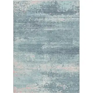 Photo of Teal Blue And Ivory Abstract Washable Indoor Outdoor Area Rug