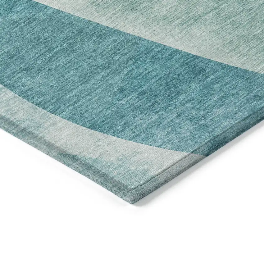 Teal Blue And Ivory Abstract Washable Indoor Outdoor Area Rug Photo 9