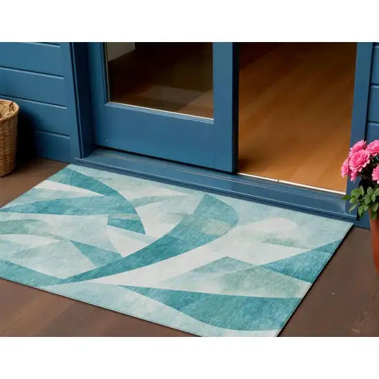 Teal Blue And Ivory Abstract Washable Indoor Outdoor Area Rug Photo 2