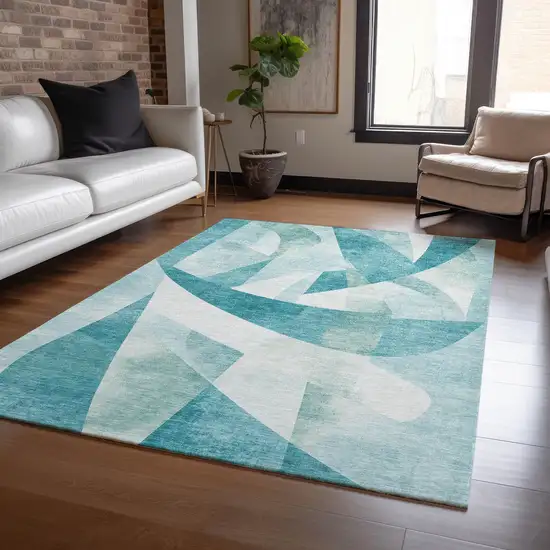 Teal Blue And Ivory Abstract Washable Indoor Outdoor Area Rug Photo 5