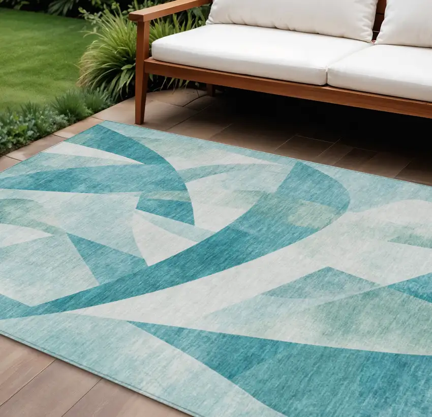 Teal Blue And Ivory Abstract Washable Indoor Outdoor Area Rug Photo 2
