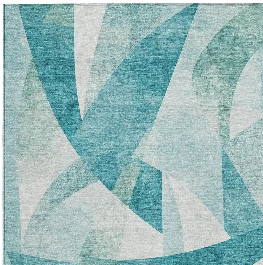 Teal Blue And Ivory Abstract Washable Indoor Outdoor Area Rug Photo 3