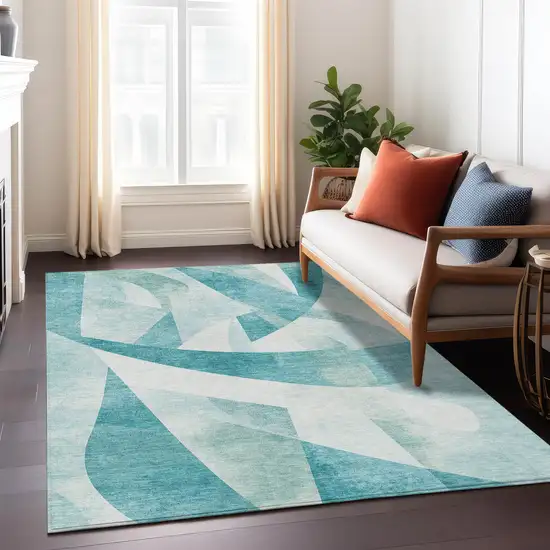 Teal Blue And Ivory Abstract Washable Indoor Outdoor Area Rug Photo 6
