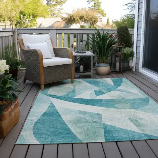 Teal Blue And Ivory Abstract Washable Indoor Outdoor Area Rug Photo 8