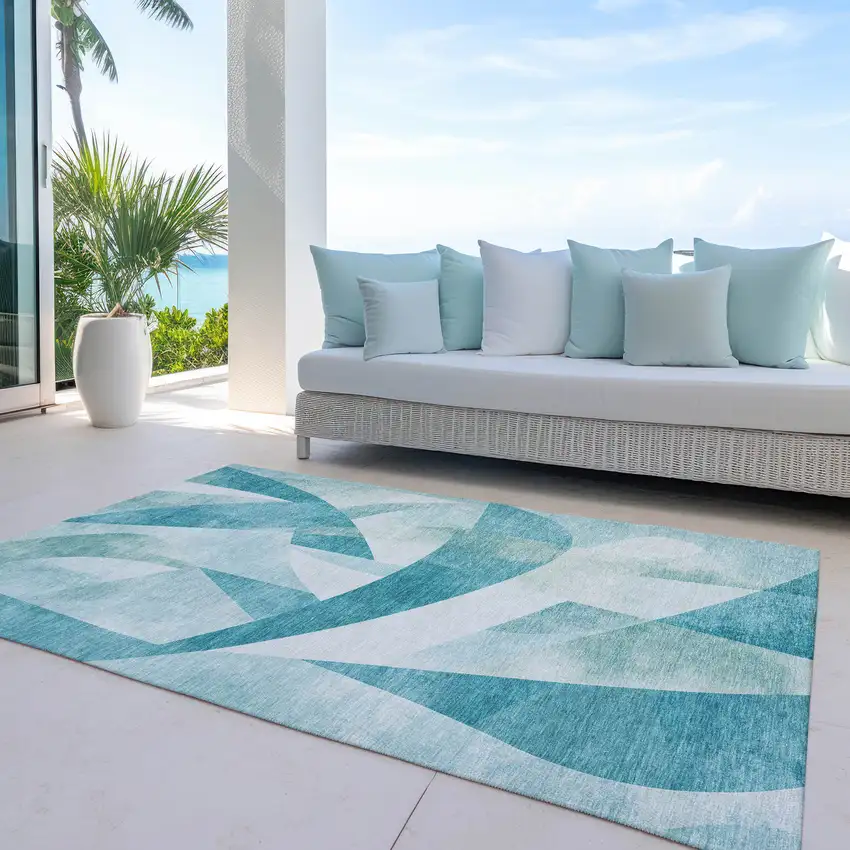 Teal Blue And Ivory Abstract Washable Indoor Outdoor Area Rug Photo 5