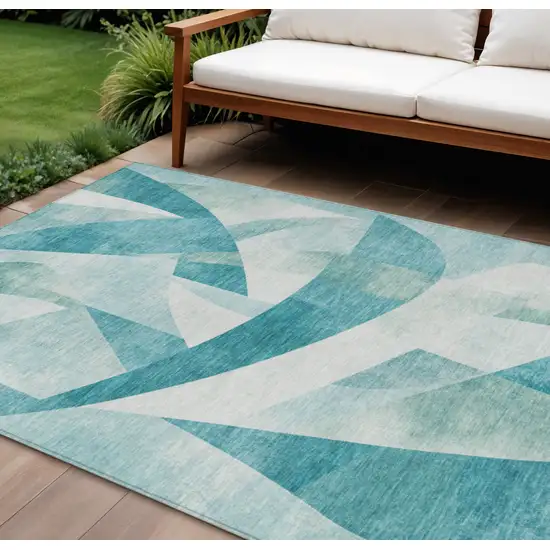 Teal Blue And Ivory Abstract Washable Indoor Outdoor Area Rug Photo 2