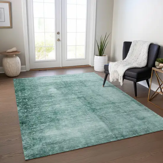 Teal Blue And Ivory Abstract Washable Indoor Outdoor Area Rug Photo 5
