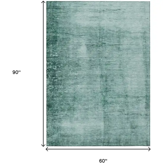Teal Blue And Ivory Abstract Washable Indoor Outdoor Area Rug Photo 9