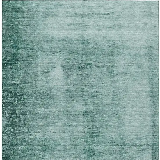 Teal Blue And Ivory Abstract Washable Indoor Outdoor Area Rug Photo 9