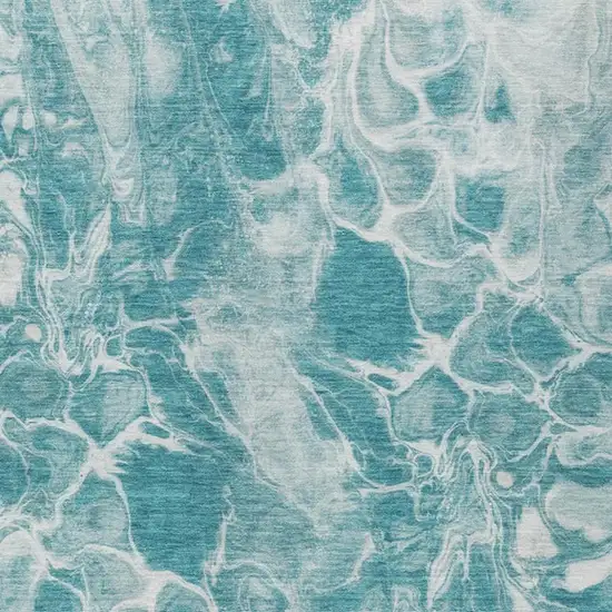 Teal Blue And Ivory Abstract Washable Indoor Outdoor Area Rug Photo 1