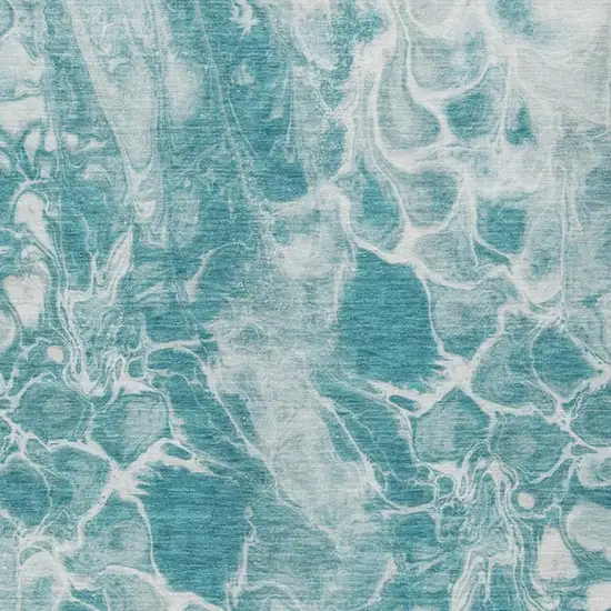 Teal Blue And Ivory Abstract Washable Indoor Outdoor Area Rug Photo 1
