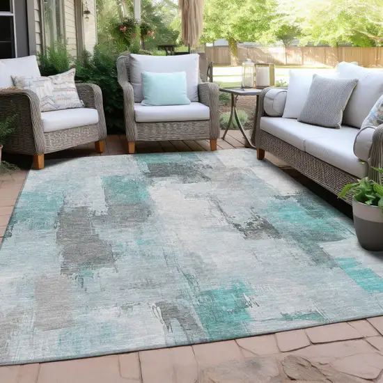 Teal Blue And Ivory Abstract Washable Indoor Outdoor Area Rug Photo 4