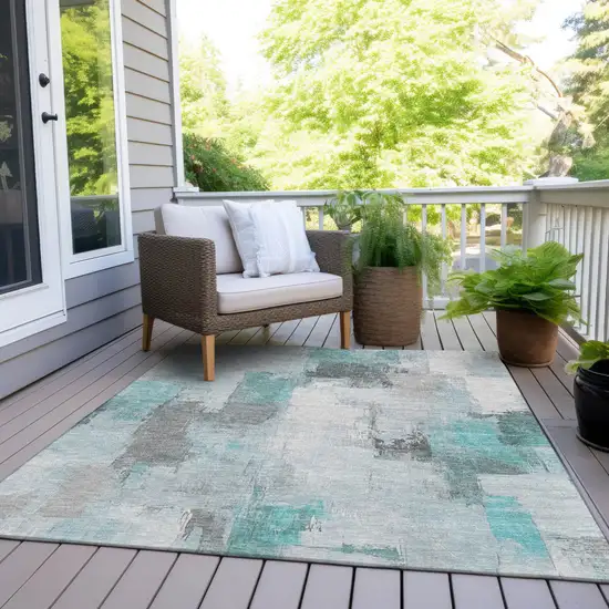 Teal Blue And Ivory Abstract Washable Indoor Outdoor Area Rug Photo 7