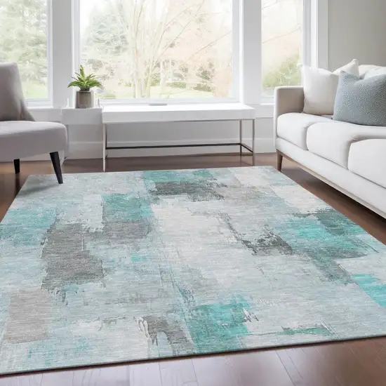 Teal Blue And Ivory Abstract Washable Indoor Outdoor Area Rug Photo 6