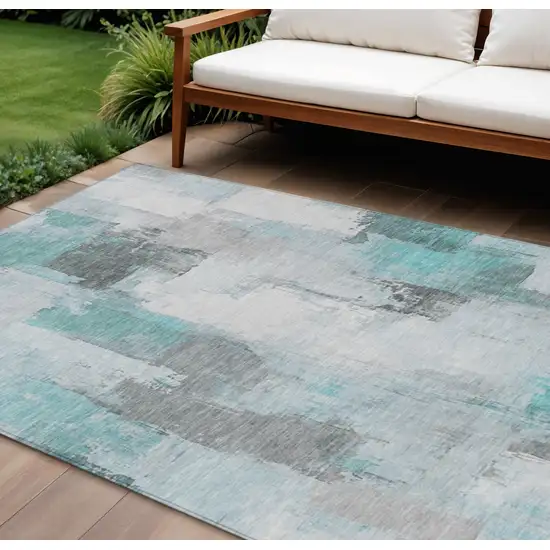 Teal Blue And Ivory Abstract Washable Indoor Outdoor Area Rug Photo 2