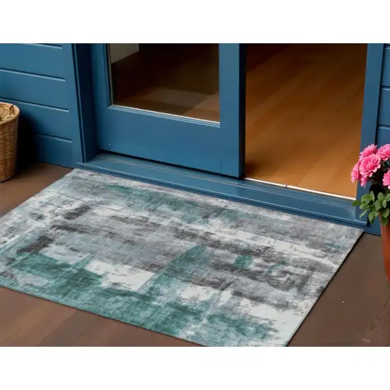 Teal Blue And Ivory Abstract Washable Indoor Outdoor Area Rug Photo 2
