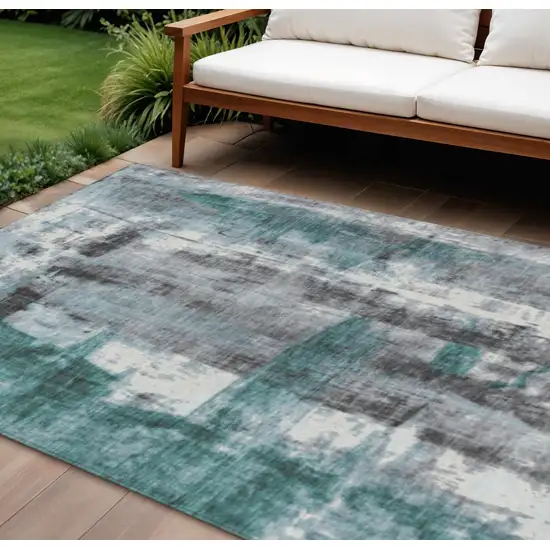 Teal Blue And Ivory Abstract Washable Indoor Outdoor Area Rug Photo 2
